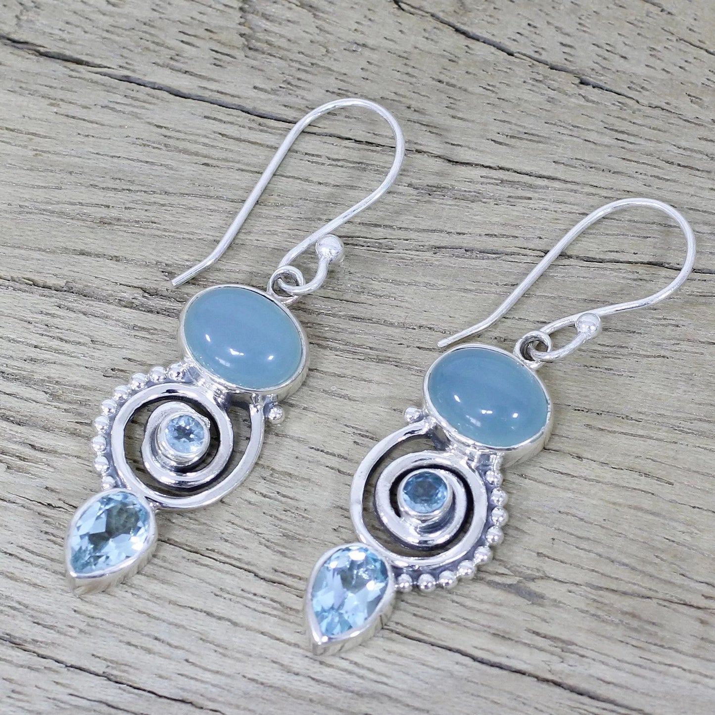 Inlaid sea blue topaz earrings